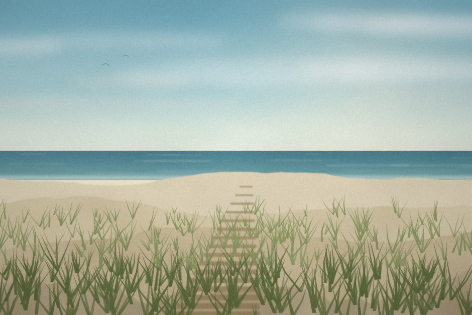 Sand dunes with marram grass and a boardwalk leading down to the sea.